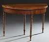 French Louis Philippe Carved Walnut Demilune Dining Table, 19th c., the hinged oval top over a wide skirt, on bobbin turned legs, H.- 29 3/8 in., W.- 