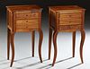 Pair of French Louis XV Style Carved Walnut Nightstands, early 20th c., the rectangular top over three drawers, on tapered cabriole legs, H.- 28 3/8 i
