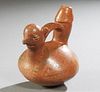 Pre-Columbian Erotic Earthenware Pitcher, of zoomorphic form, with an animal head spout, and a phallus handle, H.- 8 in., W.- 8 in., D.- 6 1/2 in.