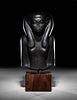 An Egyptian Basalt Portrait Bust of a Woman
Height 10 1/4 inches.