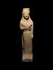 A Greek Terracotta Kore
Height 9 1/2 inches.
