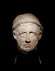 An Etruscan Over-Lifesized Nenfro Portrait Head of a Man
Height 12 1/2 inches.