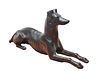 A pair of 19th century cast iron lawn or garden ornaments, in the form of a recumbent whippet dog, late 19th century, possibly J.W. Fiske Foundry of N