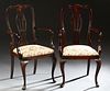 Pair of English Carved Mahogany Queen Anne Style Armchairs, early 20th c., the arched back with applied shell carving, over a pierced vertical splat, 