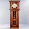 C.R. Railroad Mahogany Astronomical Floor Regulator, flat-top case with dentil crown molding, freestanding fluted columns flank the hoo