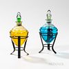 Pair of Colorless Glass Countertop Apothecary Show Globes, mounted to custom made iron stands, globe ht. 7 in.