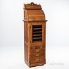 The Harvard Co. Quarter-sawn Oak Dental Cabinet, Canton, Ohio, c. 1890, roll-top upper section above hinged beveled glass midsection do