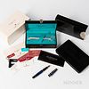 Two Fountain Pens, an Aurora piston pen in Auroloid case, and a Caran d'Ache limited edition "Lagoon" pen, both with inner and outer bo