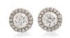 * A Pair of 14 Karat White Gold and Diamond Studs, 0.80 dwts.