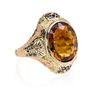 A 14 Karat Tri Color Gold and Citrine Ring, 3.60 dwts.