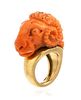 * An 18 Karat Yellow Gold and Carved Coral Ram's Head Motif Ring. 12.00 dwts.