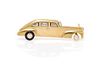 A Yellow Gold, Diamond and Rubber Car Brooch, 4.10 dwts.