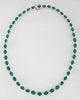 14K White Gold Link necklace, each of the 45 links with an oval emerald atop a border of small white diamonds, total emerald wt.- 30.26 cts., total di