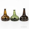 Three Blown Glass Bottles, late 18th century, one green, two olive amber, with tapering necks and bulbous bases with concave bottoms, h