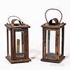Two Glazed Wooden Candle Lanterns, America, early 19th century, glazed on all four sides, with wire handles and tin candlecups, ht. 11