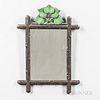 Rustic Carved Walnut-framed Mirror, America, c. 1870, with a green-painted cluster of leaves above the stick-carved frame, crossed at t