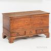 Carved Walnut Dower Chest, Pennsylvania or New Jersey, late 18th century, with molded top opening to a lidded till and drawer, the dove