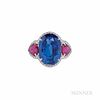 Platinum, Sapphire, and Ruby Ring, prong set with an oval-cut sapphire measuring approx. 14.52 x 10.81 x 8.96 mm, and weighing 13.26 ct