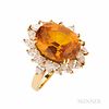 18kt Gold, Orange Sapphire, and Diamond Ring, the oval-cut sapphire measuring approx. 14.00 x 11.40 x 7.70 mm, and weighing 10.42 cts.,