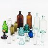 Nineteen Bottles and Two Insulators, 19th/early 20th century, including a H.H. Warner & Co., Tippecanoe bottle and various patent medic