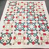 Two Appliqued Cotton Floral Medallion Quilts, a quilt top, 101 x 101, and a quilt, 78 x 91 in.