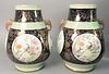 Pair of Chinese porcelain jars, having four red polychrome panels painted with birds and flowers and animal head handles, ht. 15-1/2".