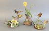 Group of three Boehm porcelain birds, "Orchard Oriole", "Robin with Daffodils", and "Fledging Canada Warbler", each stamped to the underside, hts. 9 1