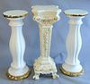 Three pedestals, pair white porcelain with gold trim along with faux marble pedestal, ht. 29 1/2", dia. 13 1/2".
