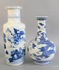 Two Chinese blue and white porcelain cases, one having painted dragon and the other with painted warriors in landscape, ht. 18 1/2".