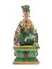 A Chinese Sancai Glazed Stoneware Figure of Seated Guanyin
Height 9 1/2 x width 4 x depth 3 1/4 inches.