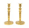 A Pair of Louis XVI Style Gilt-Bronze Candlesticks Mounted as Lamps
Height excluding fittings 12 1/4 inches.