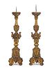 A Large Pair of  Italian Baroque Style Giltwood Pricket Sticks
Height 41 1/2 inches, plus 4 inch spike.