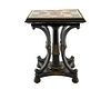 An Italian Ebonized Wood and Specimen Marble Table
Height 29 inches; dimensions of top 21 1/2 x 16 1/2 inches.