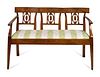 An Italian Neoclassical Style Walnut Bench
Height 33 1/2 x width 49 x depth 19 inches.