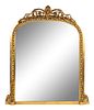 A Victorian Giltwood Overmantel Mirror
Height 60 3/4 x width 54 inches.