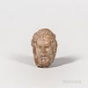 Ancient Greek Terra-cotta Fragment, early 4th century B.C., depicting a bearded man's head, probably a philosopher, painted with white