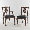 Ten Georgian-style Mahogany Dining Chairs, 20th century, comprising of two armchairs and eight side chairs each with a reticulated spla