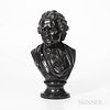 Wedgwood & Bentley Black Basalt Bust of Rousseau, England, c. 1780, mounted atop a waisted circular socle, impressed titled to bust, ma