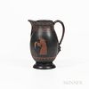 Wedgwood Encaustic Decorated Black Basalt Pitcher, England, early 19th century, oval shape with masked handle terminal, iron red and bl