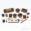 Twenty-one Pieces of Tartanware, Scotland, 19th century, including a score keeper, napkin rings, spool boxes, cribbage board, card case