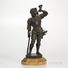 Bronze Model of a Soldier, 19th century, the standing figure in full battle armor and posed blowing a horn, dark brown patination, set