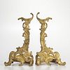 Pair of Gilt-bronze Rococo-style Chenet, France, 19th century, floral spray to a scrolled foliate body, ht. 19 in.