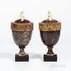Two Similar Wedgwood & Bentley Granite Vases, England, c. 1770, white terra-cotta widow finials to a goblet shape set atop a square bla