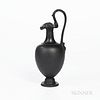Wedgwood Black Basalt Oenochoe Ewer, England, 1867, trefoil spout with foliate handle terminating at the mask head of a maiden, impress
