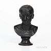 Wedgwood Black Basalt Bust of Horace, England, 19th century, mounted atop a waisted circular socle, impressed title and mark, ht. 14 1/