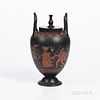 Encaustic Decorated Black Basalt Vase and Cover, England, 19th century, urn finial and upturned loop handles, iron red, black and white