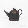 Turner Encaustic Decorated Black Basalt Teapot and Cover, England, c. 1800, lion finial, cylindrical shape with relief of classical fig
