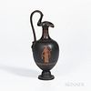 Wedgwood Encaustic Decorated Black Basalt Oenochoe Ewer, England, 19th century, scrolled handle with mask at terminal, ovoid shape with