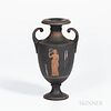 Wedgwood Encaustic Decorated Black Basalt Vase, England, early 19th century, scrolled foliate handles, iron red, black, and white, with