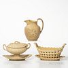 Three Wedgwood Caneware Table Items, England, early 19th century, a leaf-molded covered sauce tureen with stand and ladle, stand lg. 9;